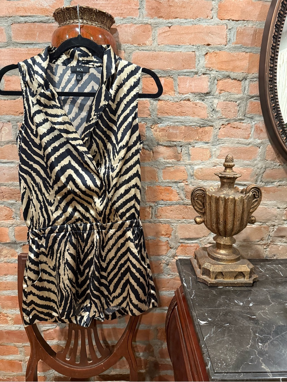 BCX Zebra-Print V-Neck Romper in Black and Cream